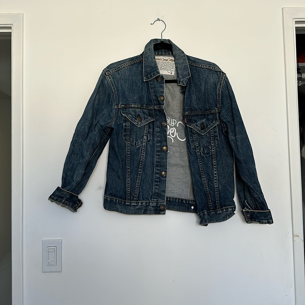 Levi’s jacket fits like SMALL
